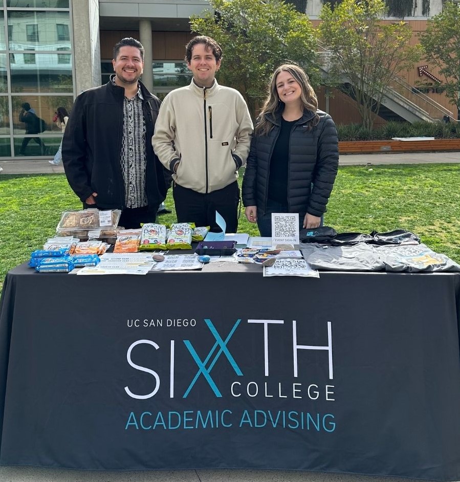 Sixth College advisors tabling outside